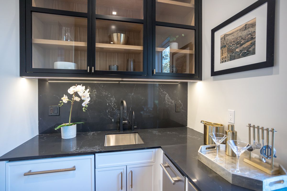 Countertop installation with subway tile backsplash and stainless appliances
