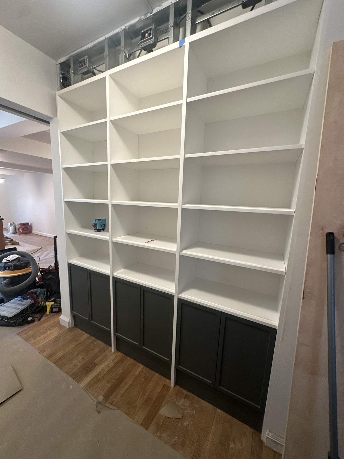 Custom kitchen cabinet detail with soft-close hinges and pull-outs