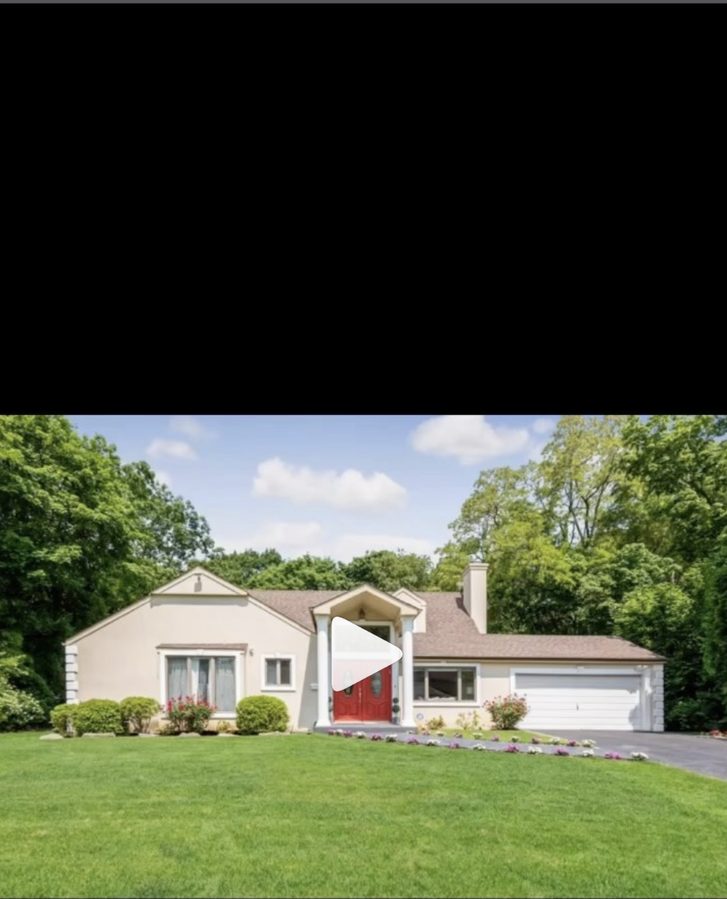 Completed exterior renovation of residential home in Roslyn, New York