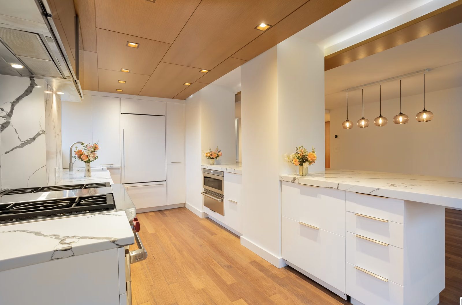 Kitchen renovation with custom cabinets and quartz countertops in Hudson Square NYC